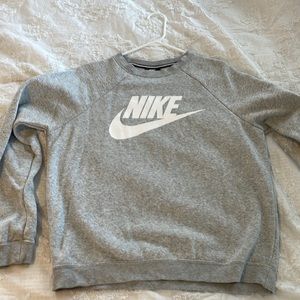 Grey Nike sweatshirt size medium still like new condition, barely worn
